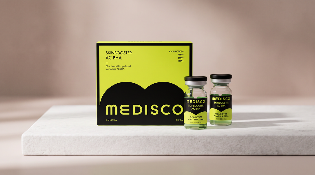 Medisco AC BHA Skin Booster box and vials displayed on a white stone surface