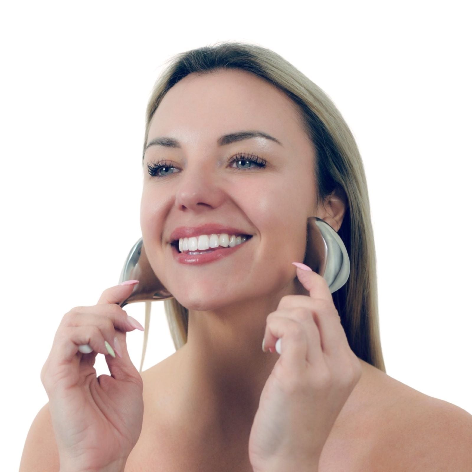 Woman using a cryo facial roller on her cheek against a clean white background