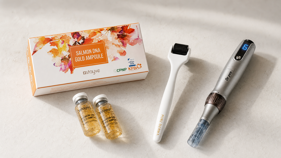 Stayve Salmon DNA Gold PDRN skin booster box and ampoule vials next to a derma roller and Dr. Pen microneedling device on a stone surface