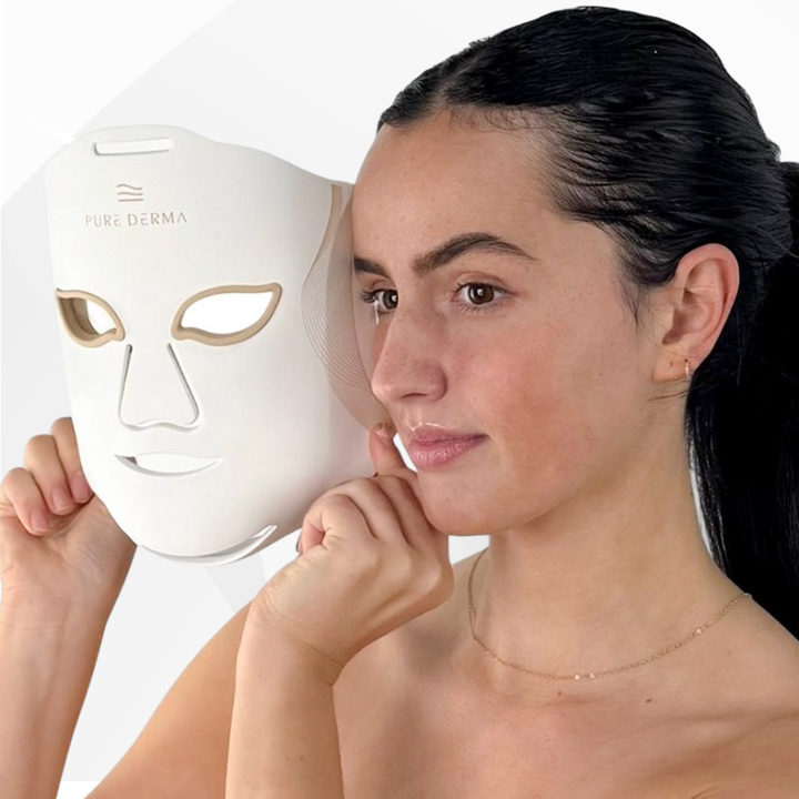 woman holding a Pure Derma led face mask