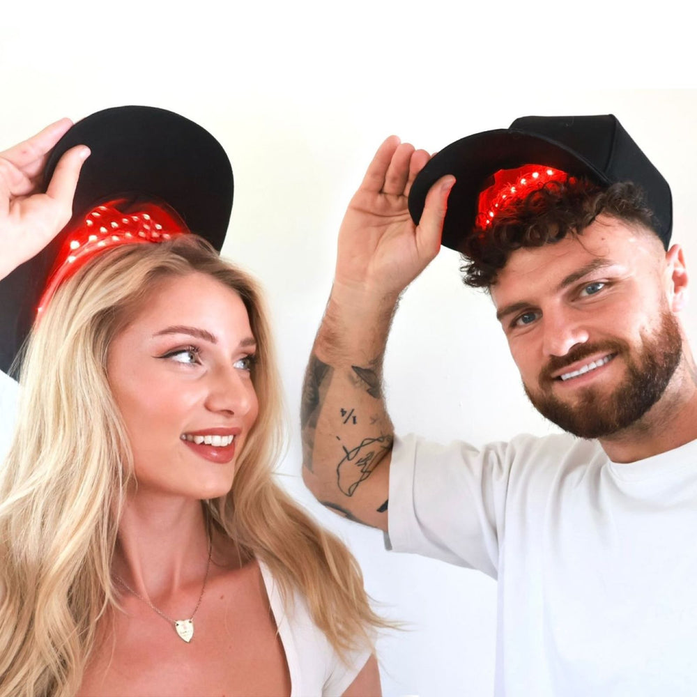 LED red light therapy hair growth cap with male and female models 