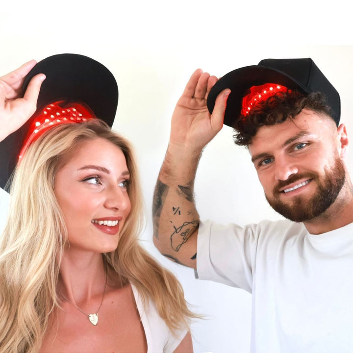 LED red light therapy hair growth cap with male and female models 