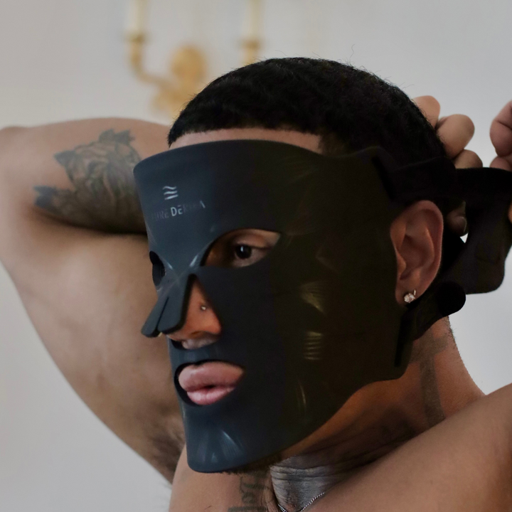 model wearing black men's LED light therapy face mask