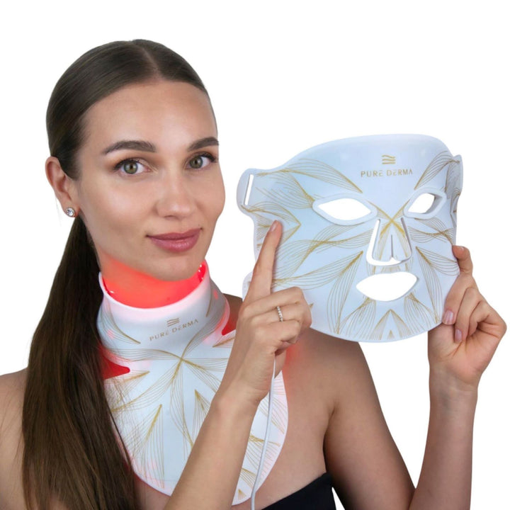 model holding Pure Derma London LED light therapy face neck & décolletage mask